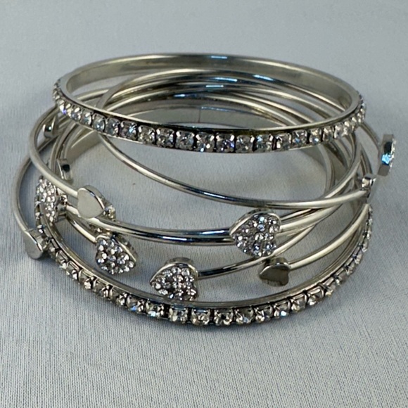 Set of eight silver tone bangles with clear rhinestones - Picture 1 of 4